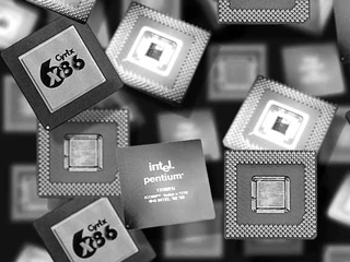 A photo featuring many computer processors in black and white A photo featuring many computer processors in black and white